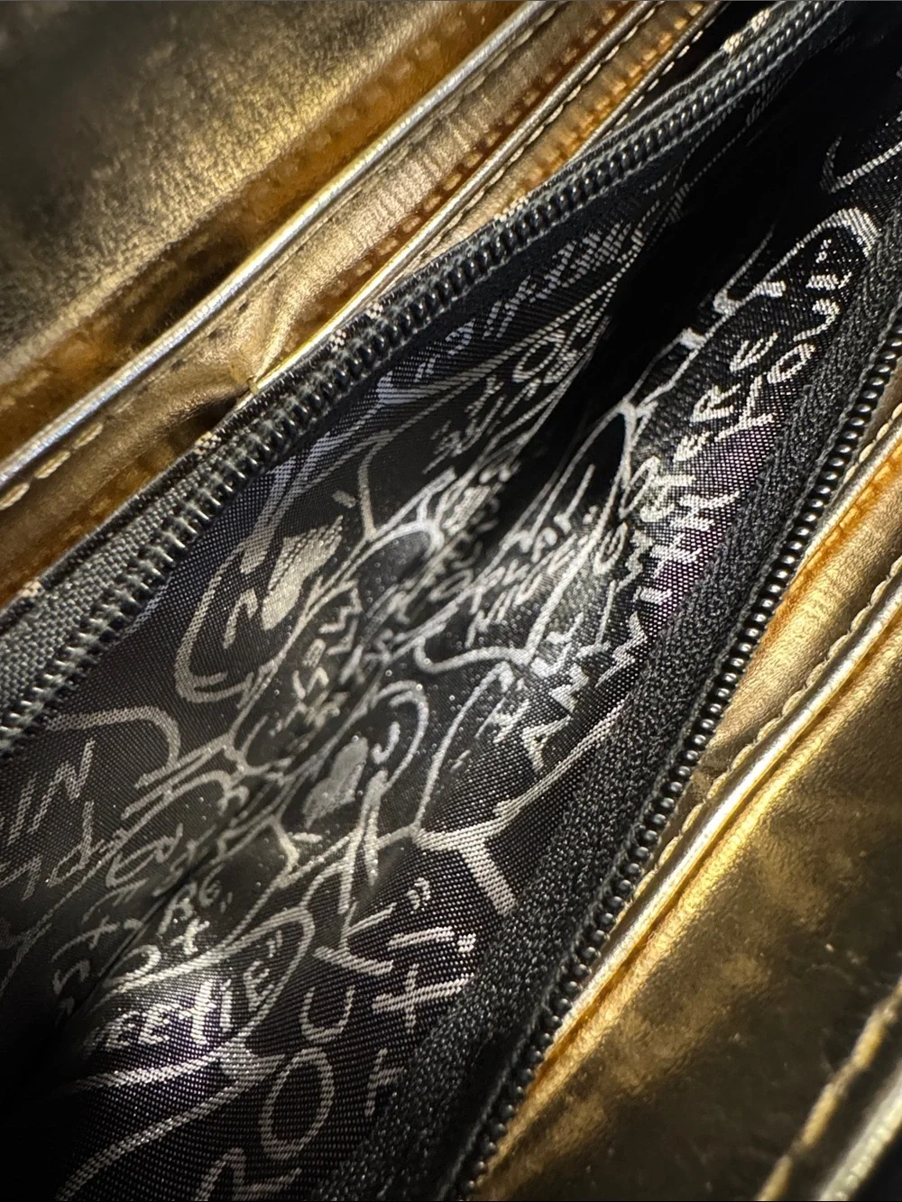 Betsey Johnson Black and Beige Logo Zip-Around Wristlet